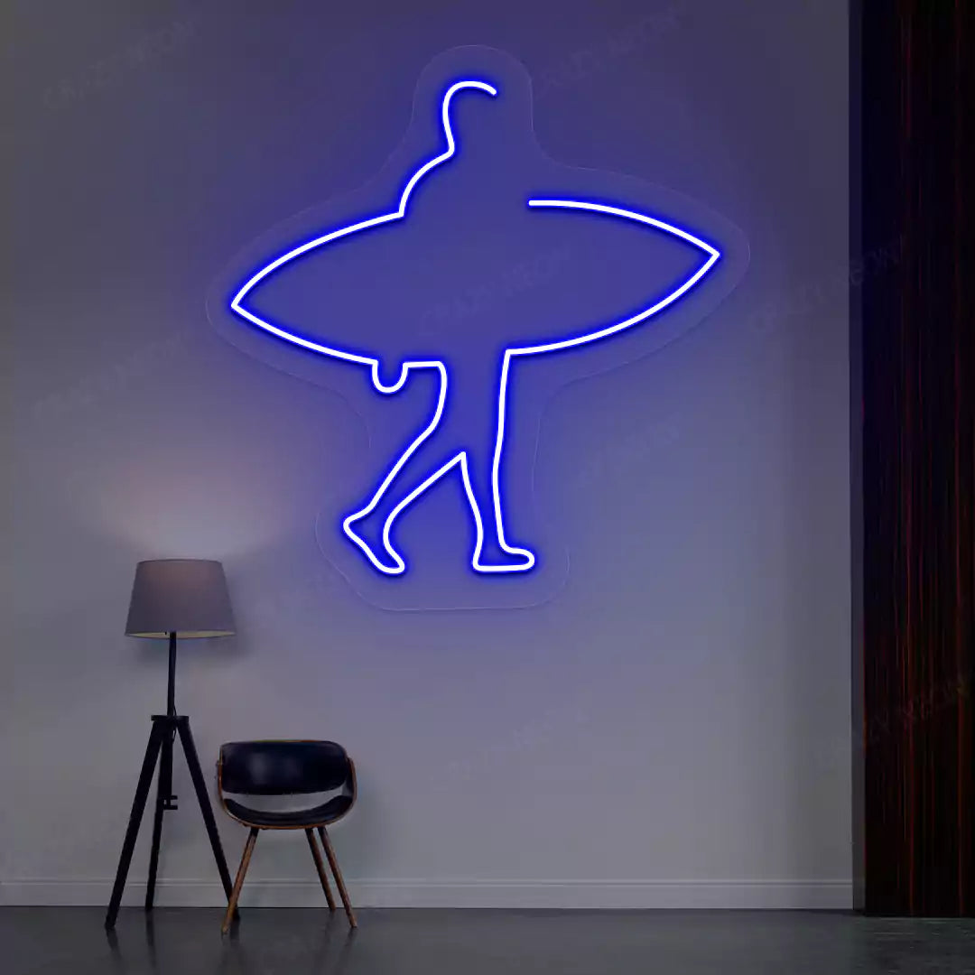 blue man surfer neon sign mounted on a wall