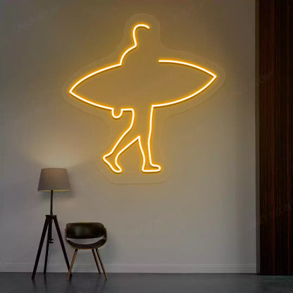 orange man surfer neon sign mounted on a wall