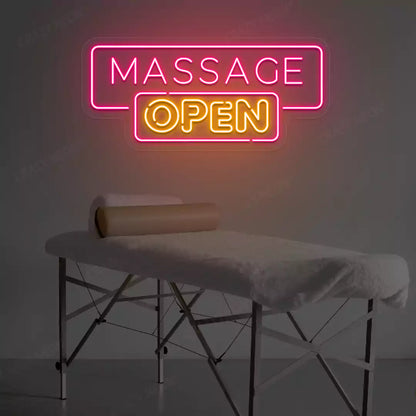 Massage Open neon sign in pink and orange colors glowing in a spa room