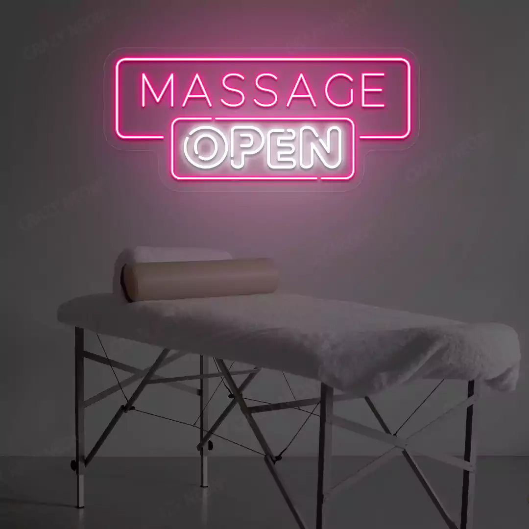 Massage Open neon sign in pink and white colors glowing in a spa room