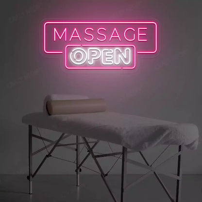 Massage Open neon sign in pink and white colors glowing in a spa room