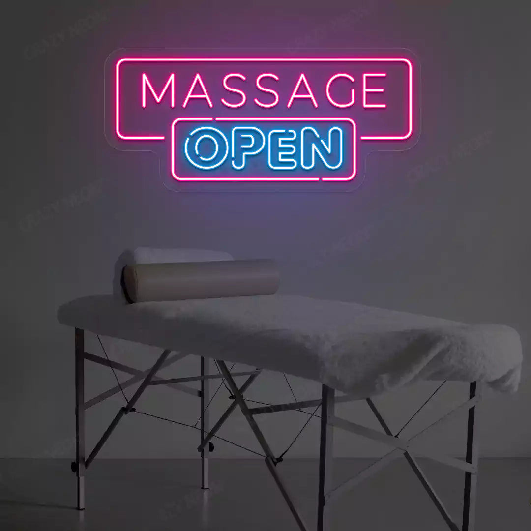 Massage Open neon sign in pink and ice blue colors glowing in a spa room