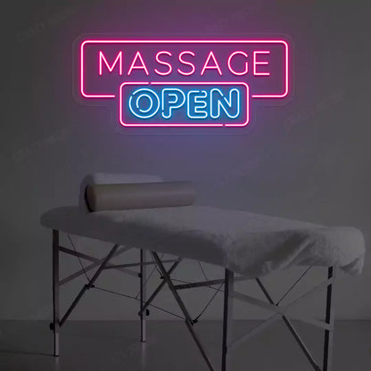 Massage Open neon sign in pink and ice blue colors glowing in a spa room