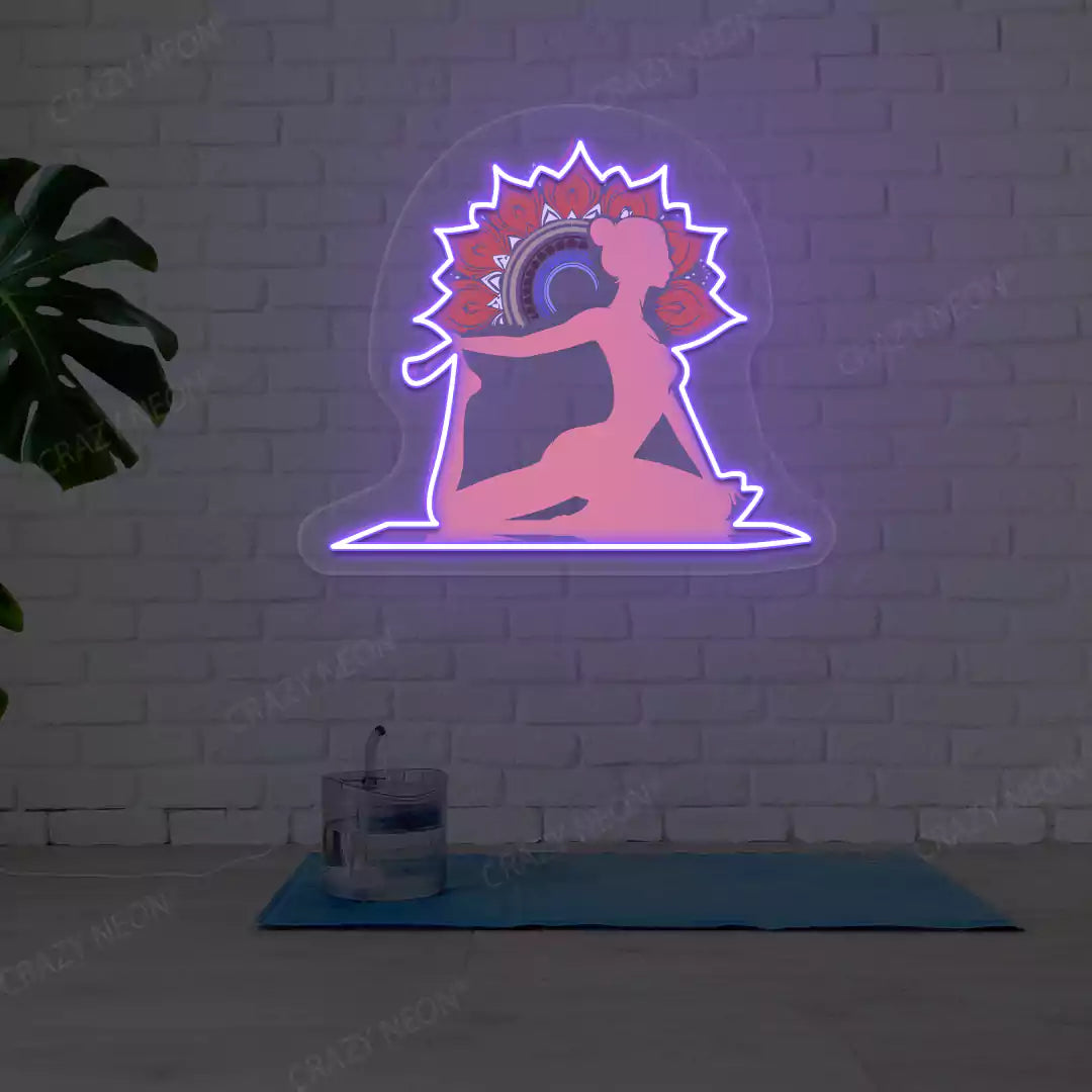 One-Legged King Pigeon Pose Mandala Yoga Neon Artwork lighting up in purple color in a yoga room