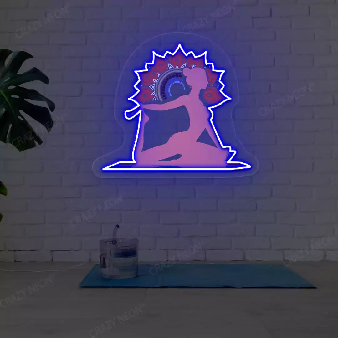 One-Legged King Pigeon Pose Mandala Yoga Neon Artwork lighting up in blue color in a yoga room
