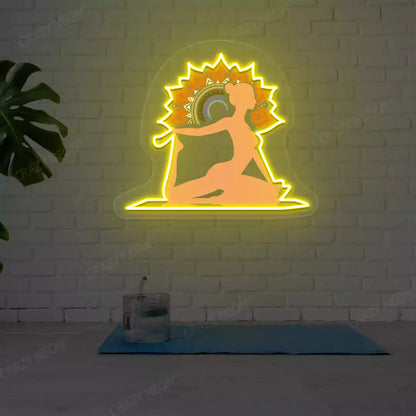 One-Legged King Pigeon Pose Mandala Yoga Neon Artwork lighting up in yellow color in a yoga room