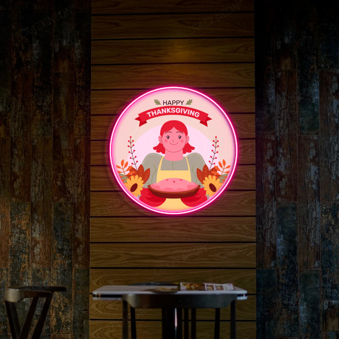 Thanksgiving pie with red-haired chef neon sign in pink
