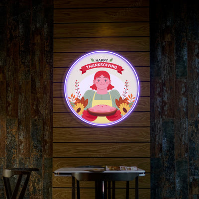 Thanksgiving pie with red-haired chef neon sign in purple