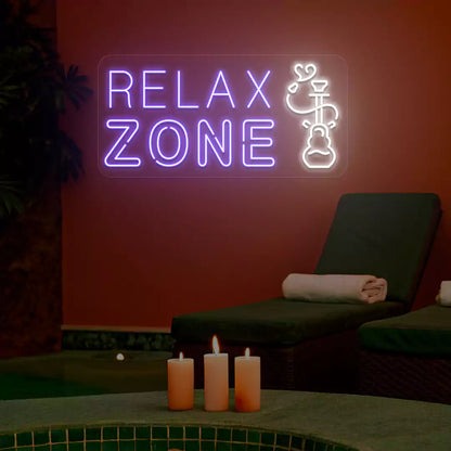 Purple and white Relax Zone neon sign glowing on a wall