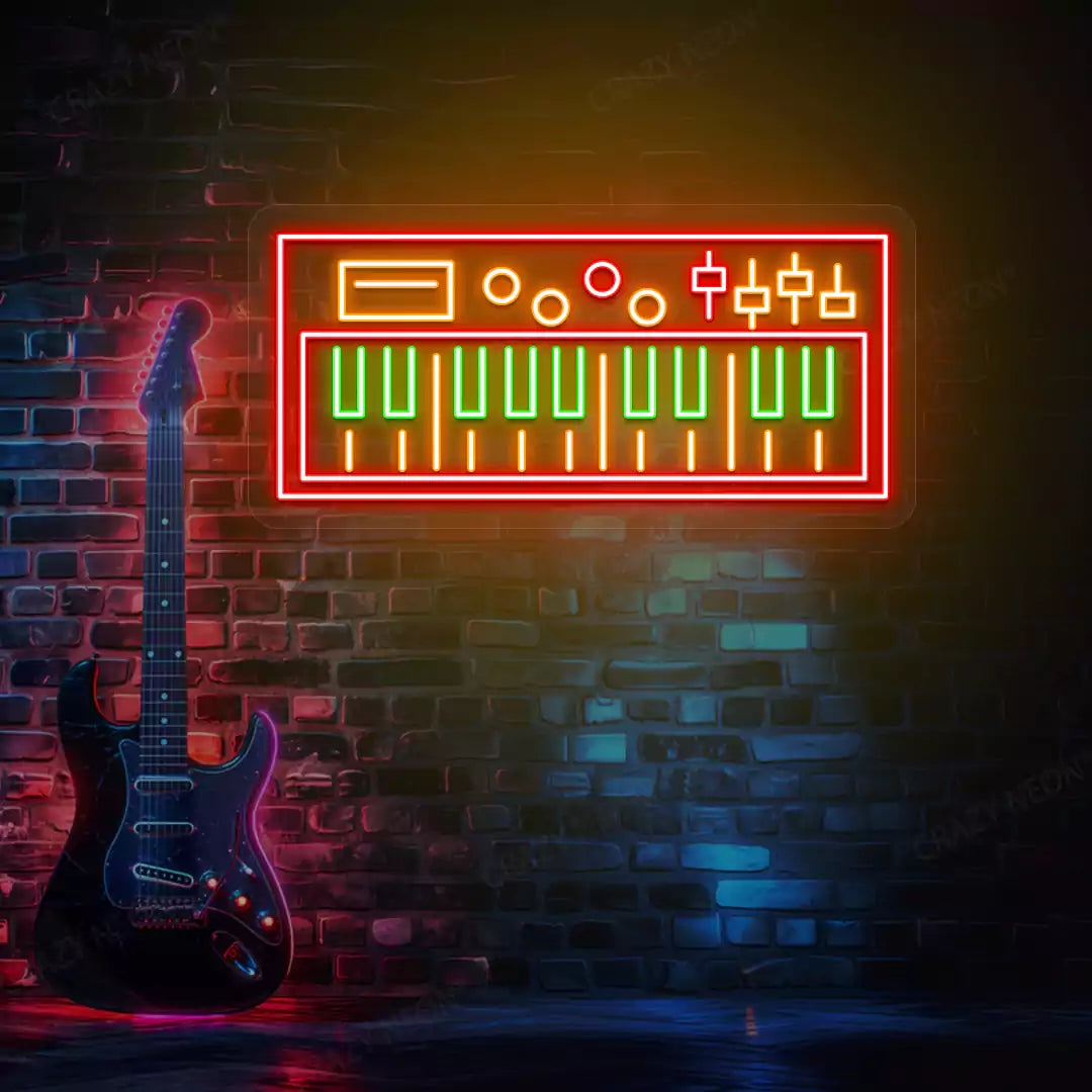 green and red synth keyboard neon sign mounted on a wall