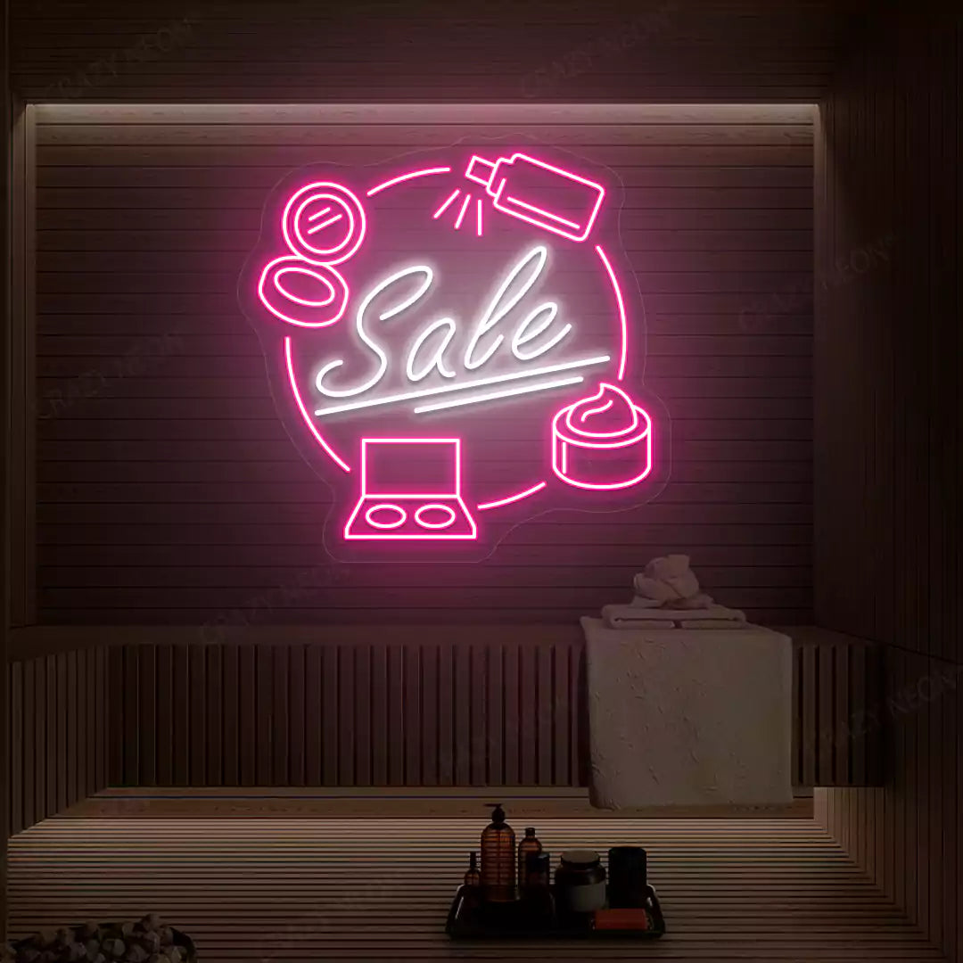 Pink and white Cosmetic Sale neon sign glowing on a wooden wall