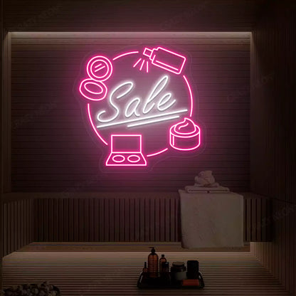 Pink and white Cosmetic Sale neon sign glowing on a wooden wall