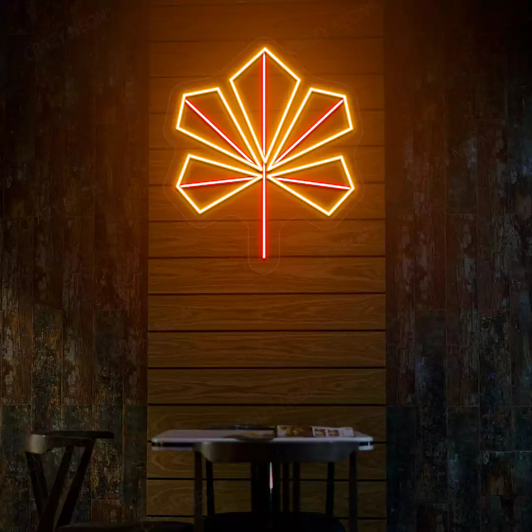 Geometric maple leaf neon sign in orange and red