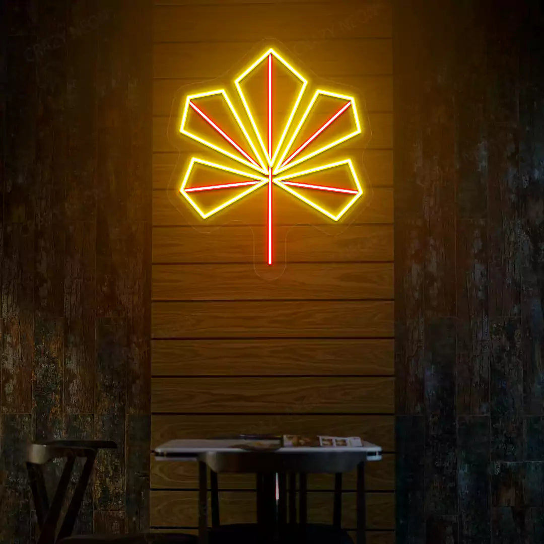 Geometric maple leaf neon sign in yellow and red
