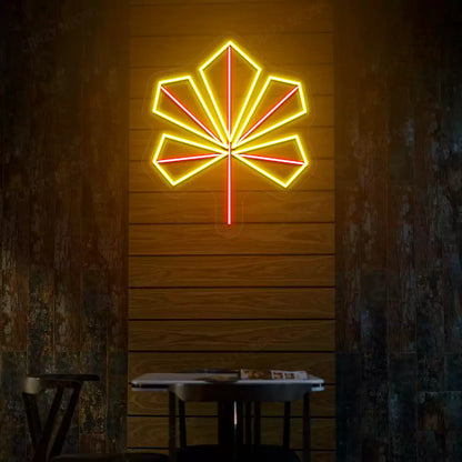 Geometric maple leaf neon sign in yellow and red