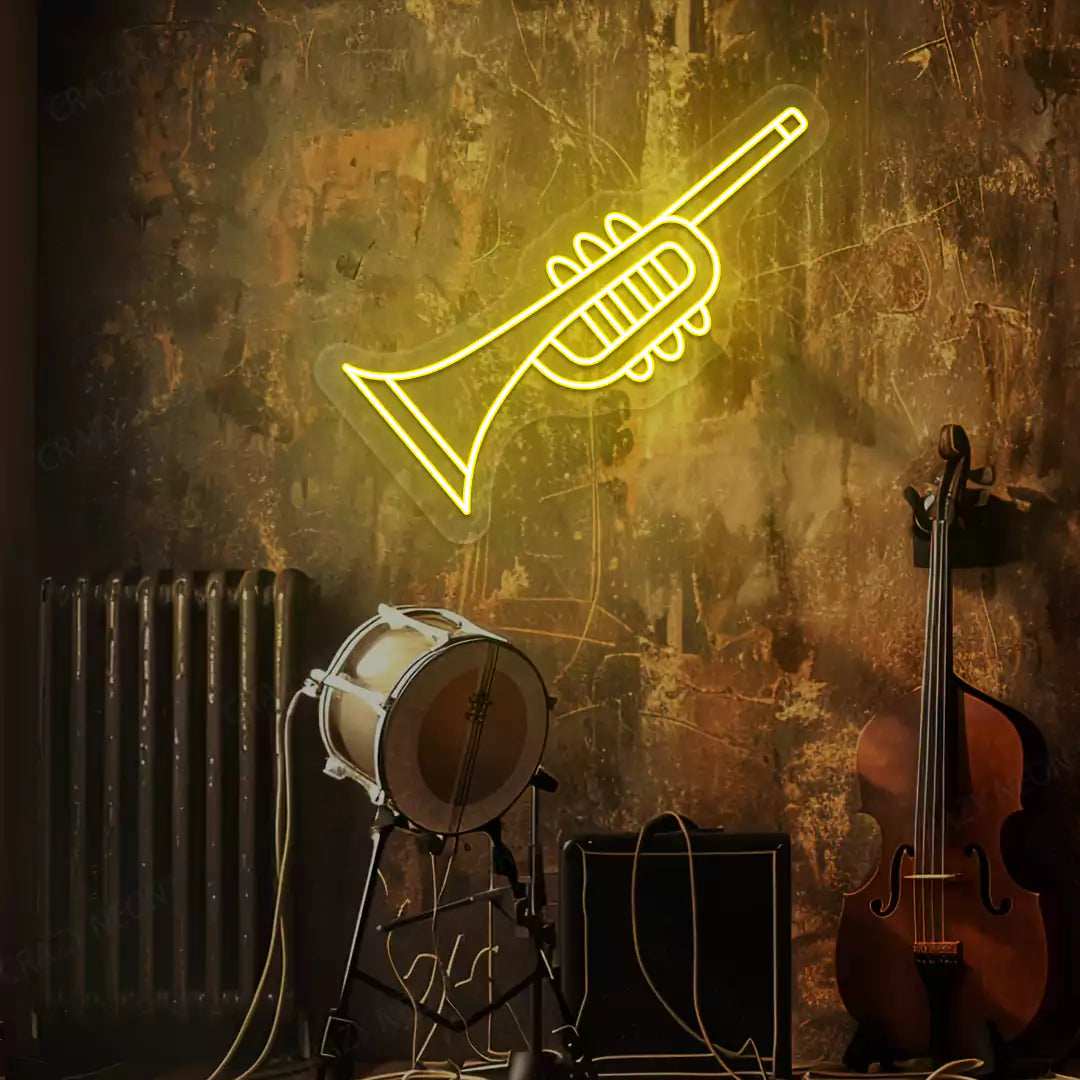 yellow trumpet neon sign mounted on a wall