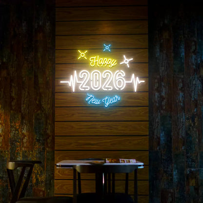 Happy 2026 New Year neon sign in white yellow and blue lights mounted on a wooden wall 