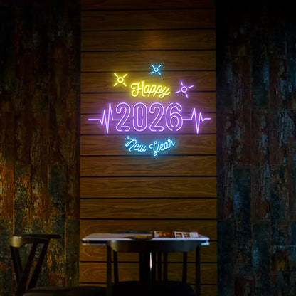 Happy 2026 New Year neon sign in purple yellow and blue lights mounted on a wooden wall