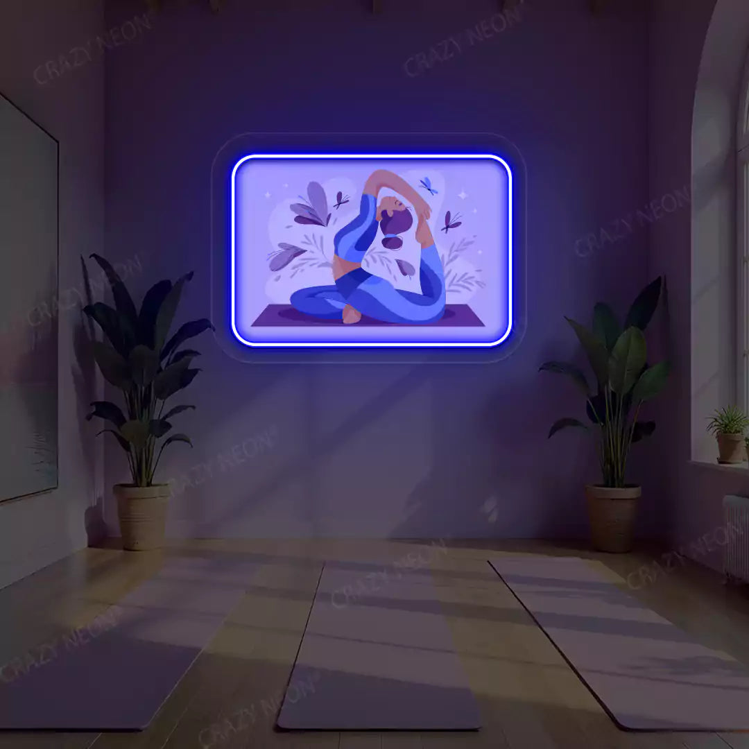 Rajakapotasana Yoga Neon Artwork lighting up in blue color in a yoga room