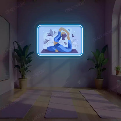 Rajakapotasana Yoga Neon Artwork lighting up in iceblue color in a yoga room