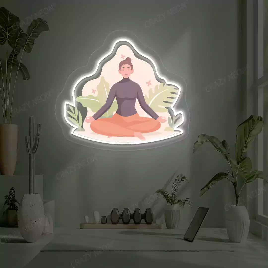 Sukhasana Leaf Yoga Neon Artwork lighting up in white color in a yoga room