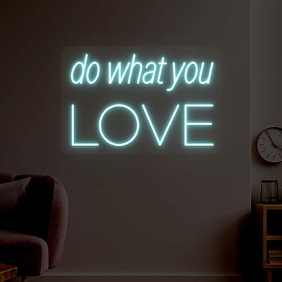 ice blue do what you love neon sign mounted on a wall