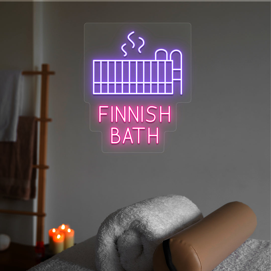 Finnish Bath neon sign in purple and pink colors glowing in a spa room