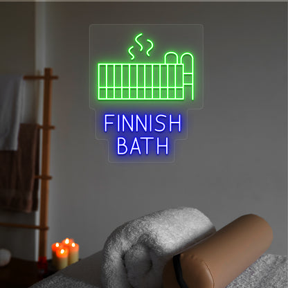 Finnish Bath neon sign in green and blue colors glowing in a spa room