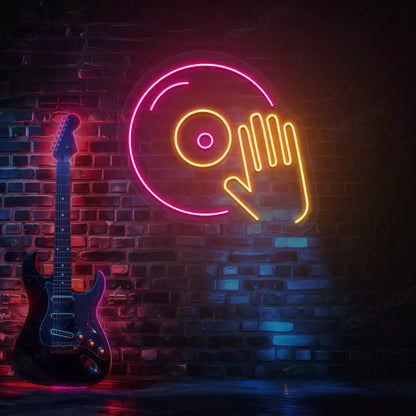 orange and pink dj turntable neon sign mounted on a wall