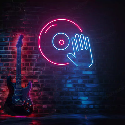 ice blue and pink dj turntable neon sign mounted on a wall