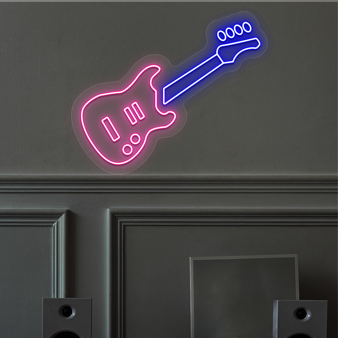 pink and blue electric guitar neon sign mounted on a wall