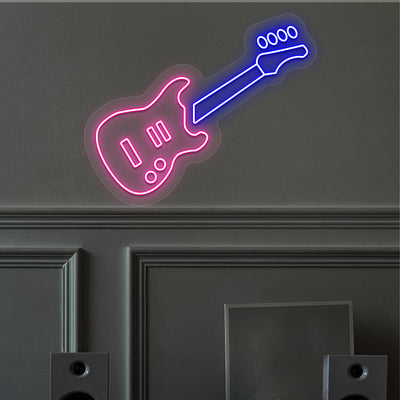 pink and blue electric guitar neon sign mounted on a wall