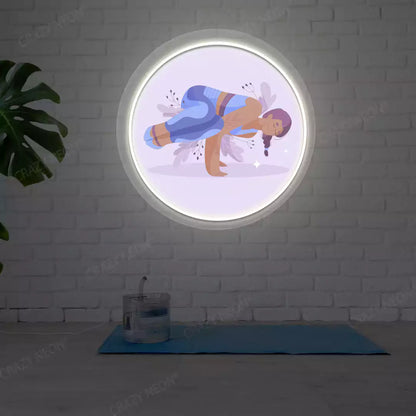 Parsva Bakasana Yoga Neon Artwork lighting up in warm white color in a yoga room