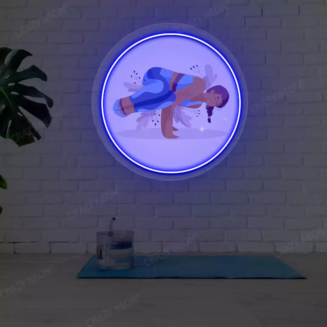 Parsva Bakasana Yoga Neon Artwork lighting up in blue color in a yoga room