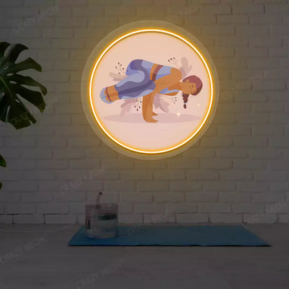 Parsva Bakasana Yoga Neon Artwork lighting up in orange color in a yoga room