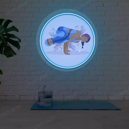 Parsva Bakasana Yoga Neon Artwork lighting up in iceblue color in a yoga room